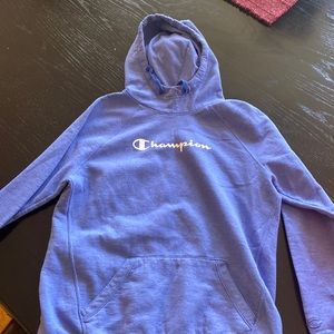 Blue champion hoodie, size medium.